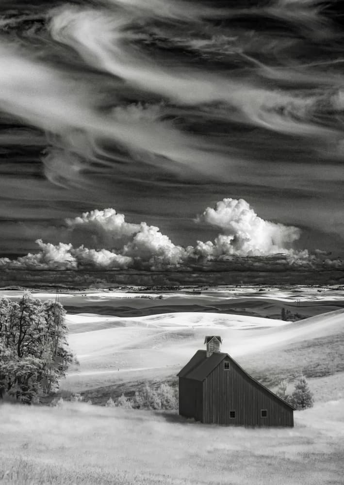 Rustic Barn Under Dramatic Sky by Rob Darby — canvas wall art