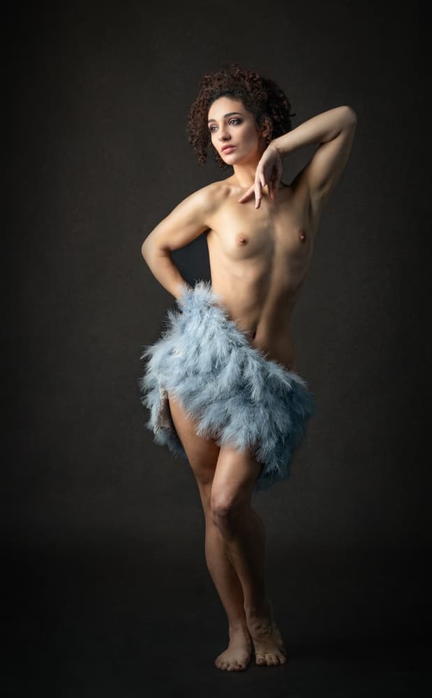Elegant Woman Blue Feathers by Luc Stalmans — canvas wall art