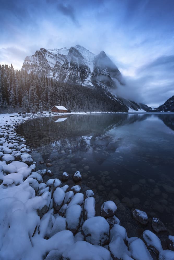 Snowy Mountain Lake Cabin by David Martin Castan — canvas wall art