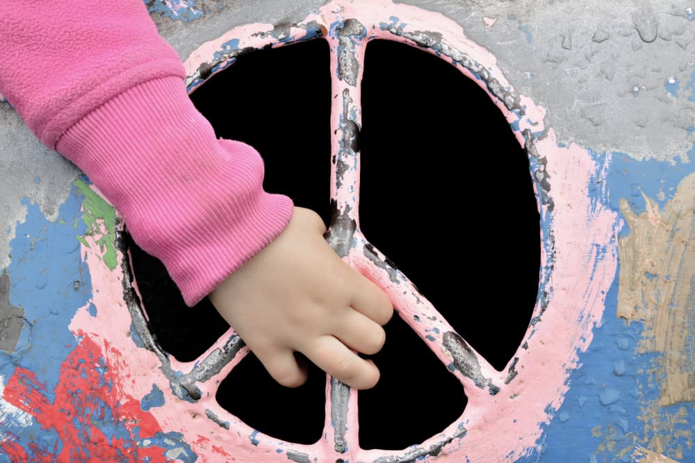 Child's Hand Peace Sign by Christina Sillen — canvas wall art
