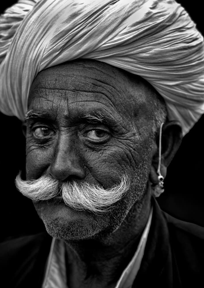 White Turban Man Portrait by Jassi Oberai — canvas wall art