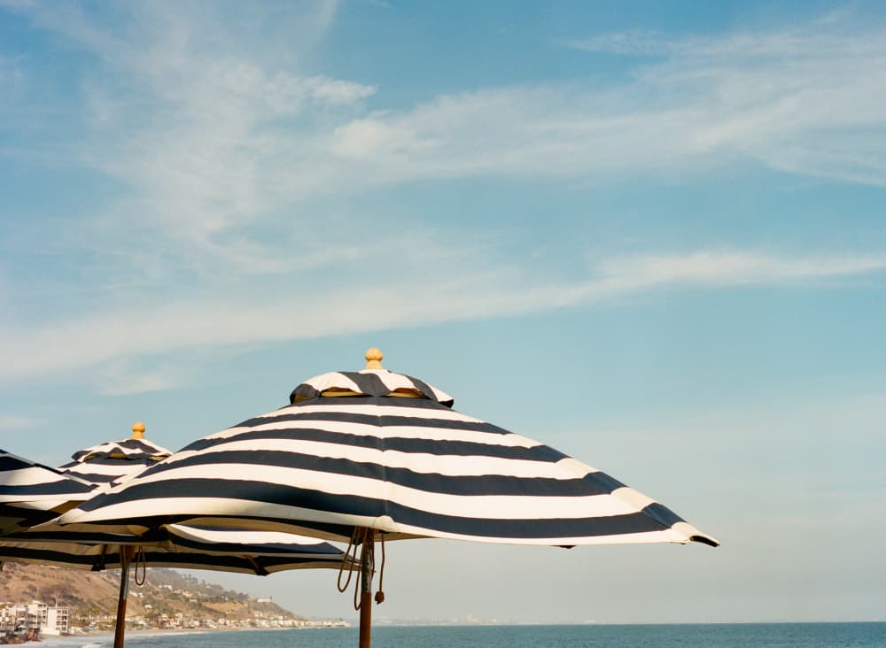 Striped Beach Umbrellas by Bethany Young — canvas wall art