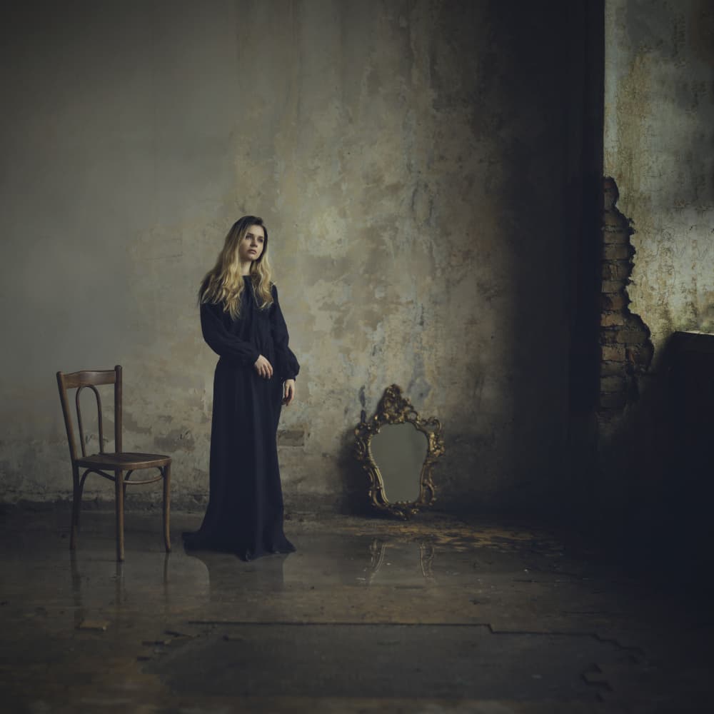Pensive Woman In Room by Raluca Arhire — canvas wall art