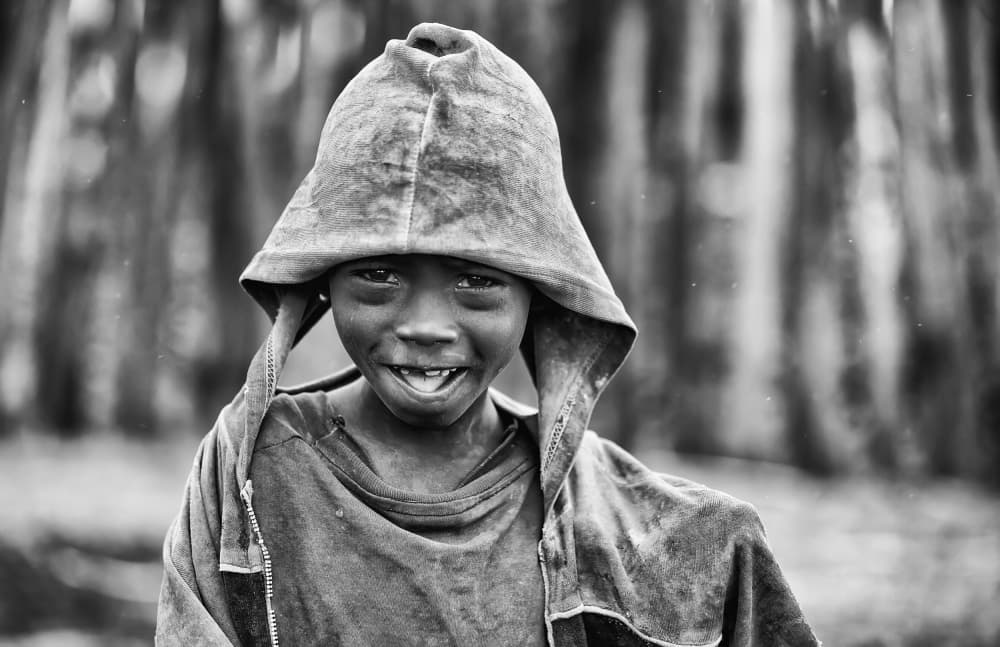 Joyful Hooded Child by Goran Jovic — canvas wall art