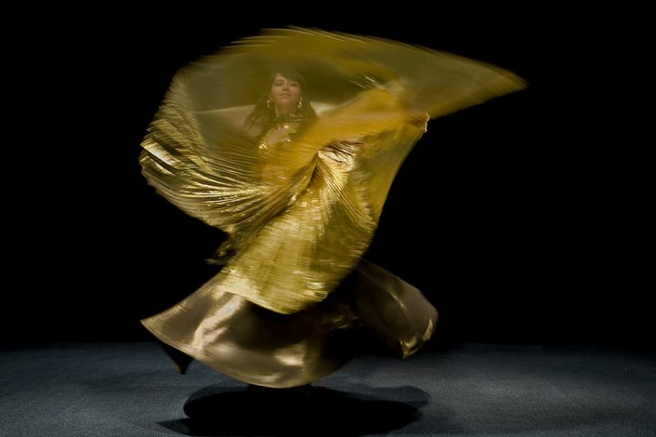 Golden Dance Motion by Jure Kravanja — canvas wall art