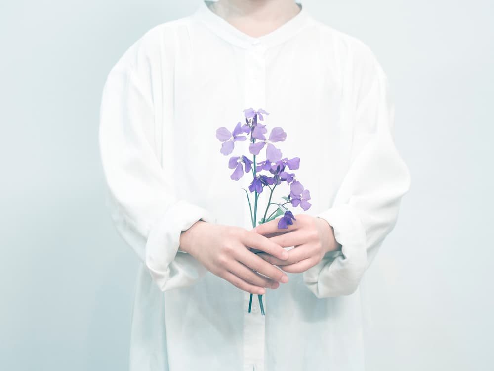 Holding Purple Flowers by Takashi Suzuki — canvas wall art