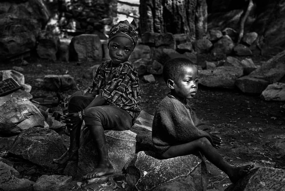 Pensive African Children by Joxe Inazio Kuesta Garmendia — canvas wall art