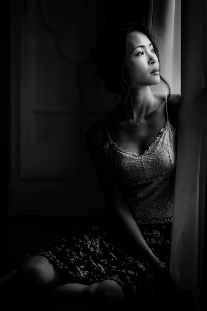 Pensive Woman by Window by Eiji Yamamoto — canvas wall art