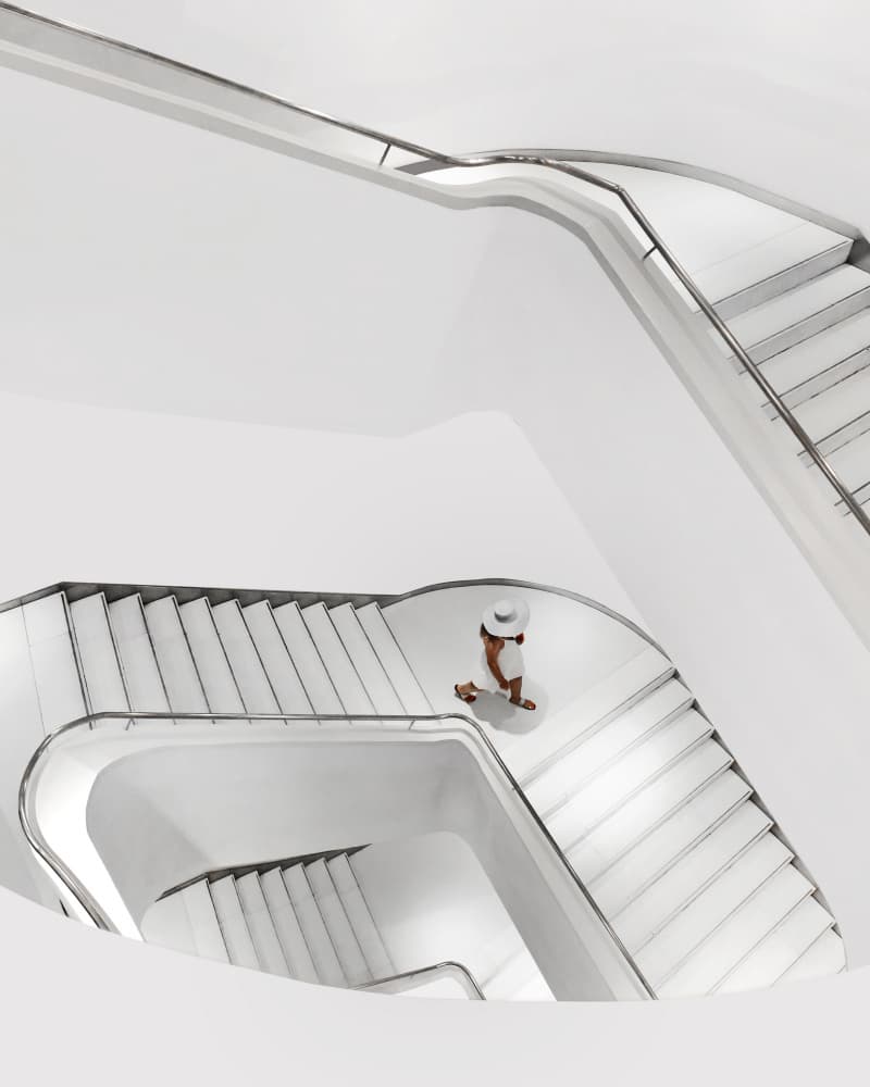 Woman On White Staircase by Jorge Pimenta — canvas wall art