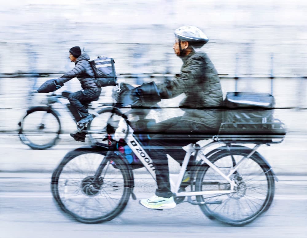 Dynamic Urban Cyclists by Jasmine Zhang — canvas wall art