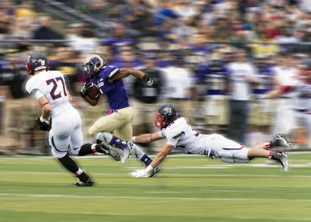 Football Action Blur by Rob Li — canvas wall art