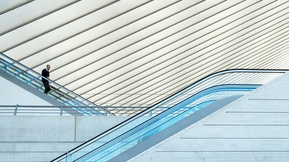 Man on Modern Escalator by Lus Joosten — canvas wall art