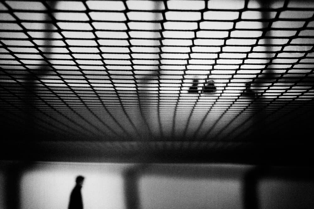 Grid Shadows Solitary Figure by Laura Mexia — canvas wall art