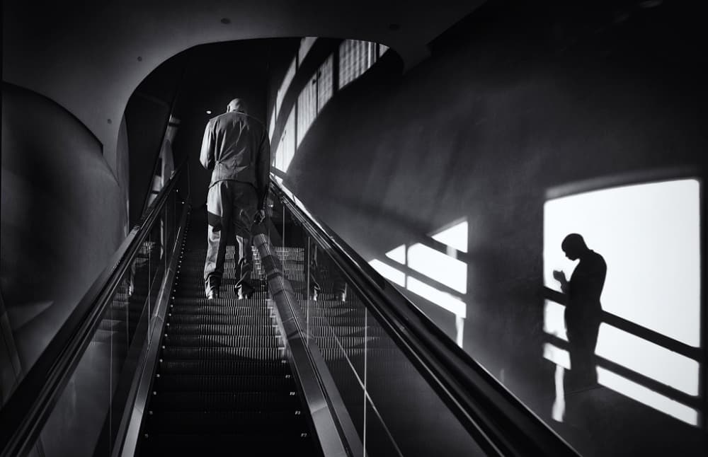 Man Ascending Shadows by Izidor Gasperlin — canvas wall art