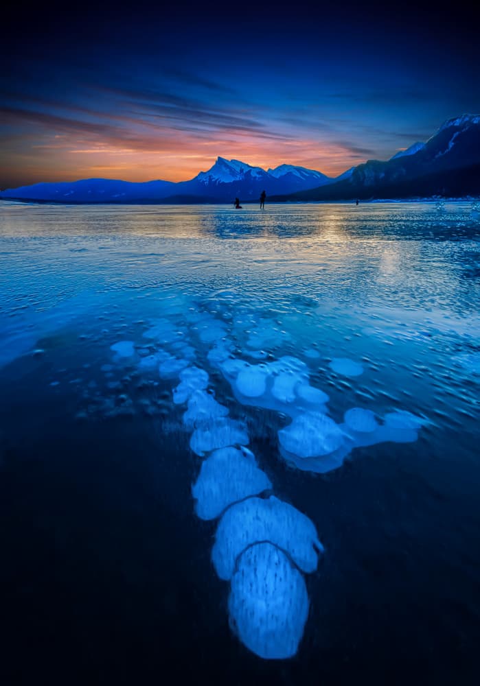 Frozen Methane Lake Sunset by Jiahong Zeng — canvas wall art