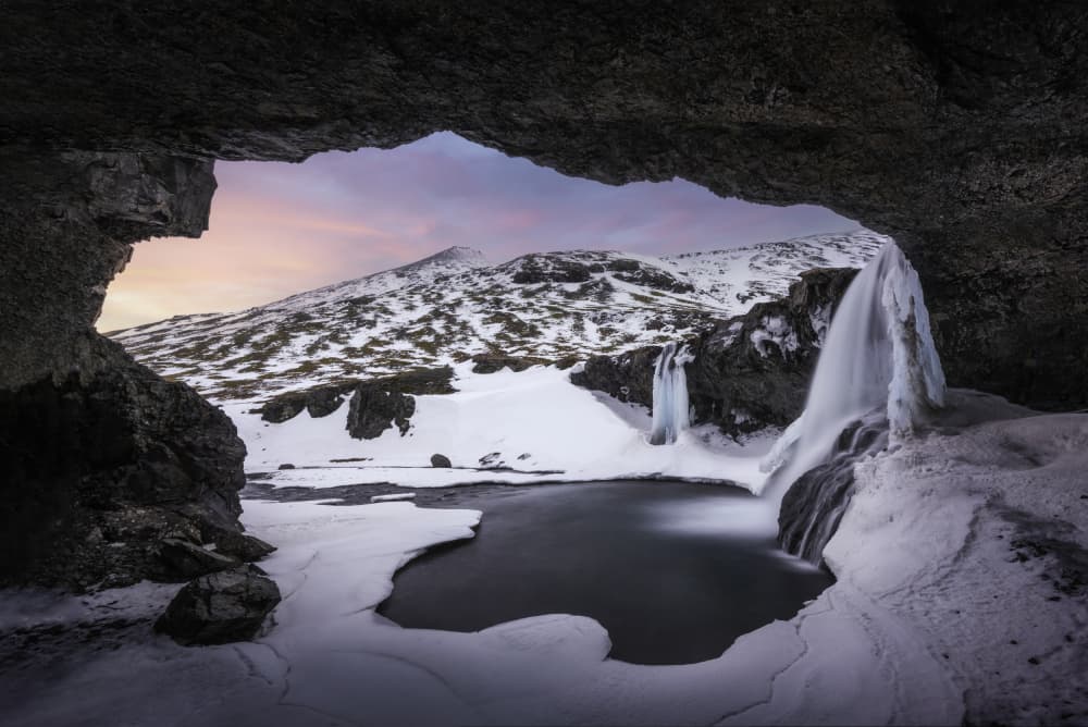 Winter Cave Waterfall by Jorge Ruiz Dueso — canvas wall art