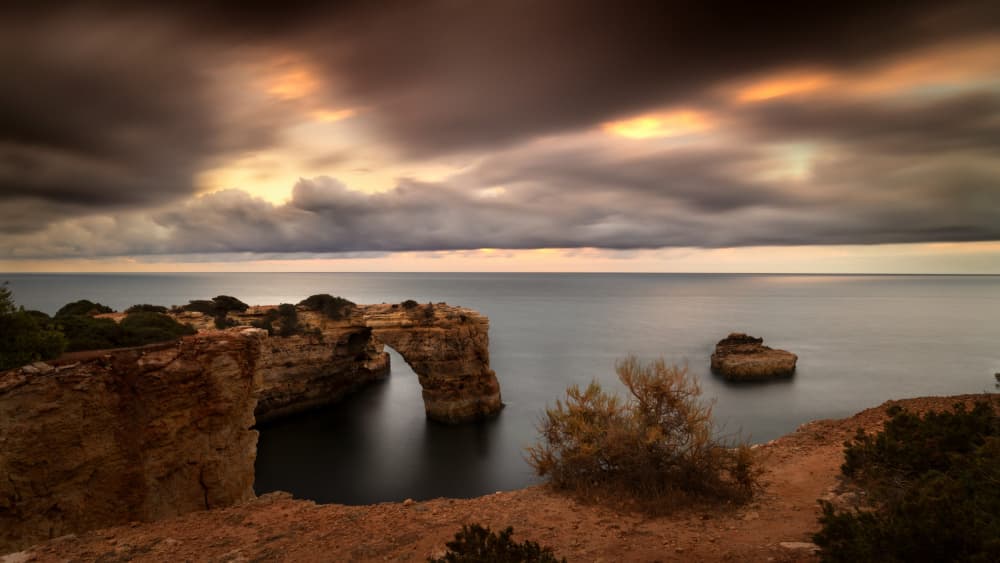 Dramatic Sea Arch Sunset by Gonçalo Capitão — canvas wall art