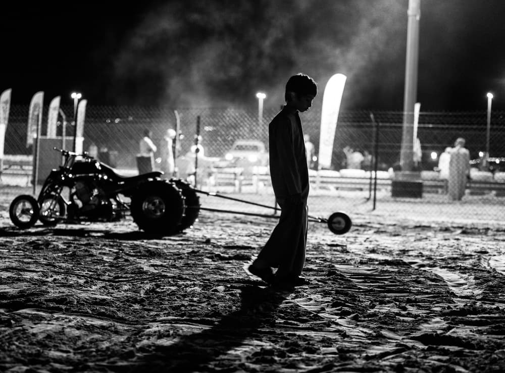 Pensive Boy Night Race by Rami Al Adwan — canvas wall art