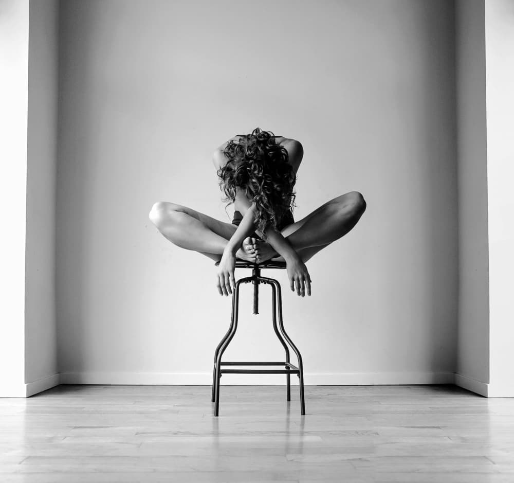 Graceful Figure On Stool by Tyler McAuley — canvas wall art