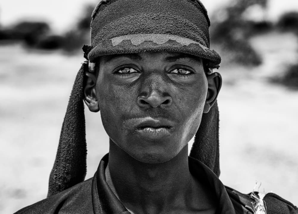 Intense Gaze Portrait by Joxe Inazio Kuesta Garmendia — canvas wall art