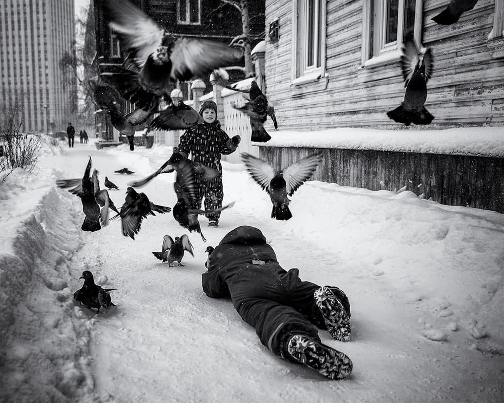 Children Playing Winter Pigeons by Marcel Rebro — canvas wall art