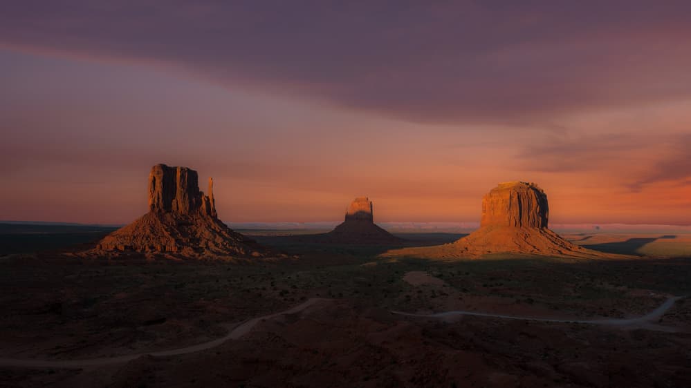 Monument Valley Sunset Glow by Branko Markovic — canvas wall art