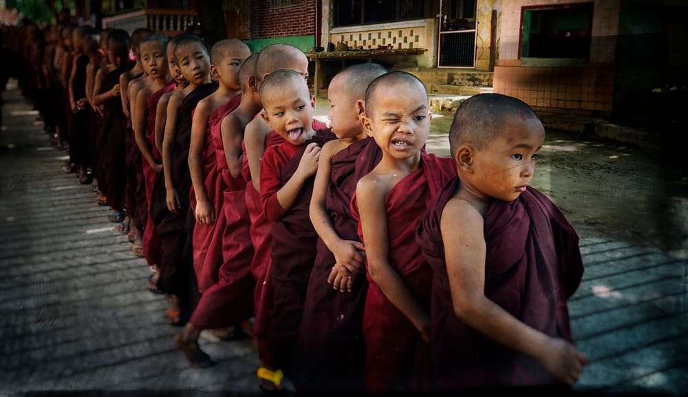 Playful Young Monks by Elena Molina — canvas wall art