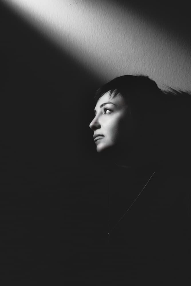Contemplative Profile in Light by M. Emre Erol — canvas wall art