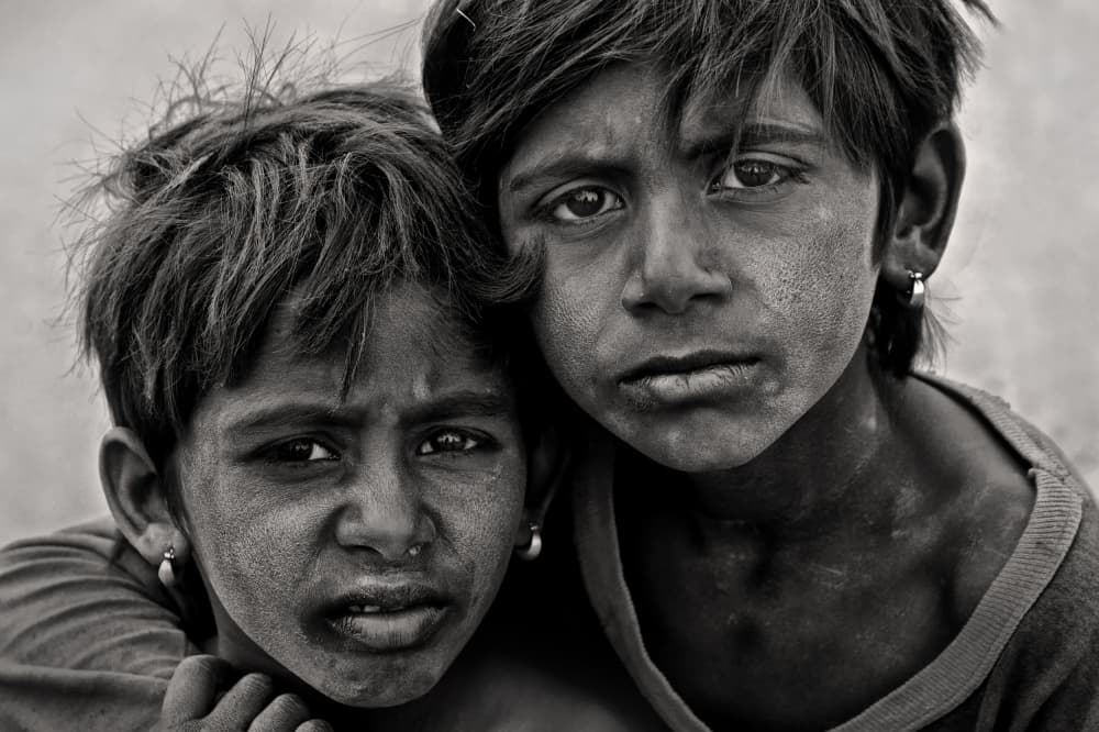 Somber Young Gaze by Lou Urlings — canvas wall art