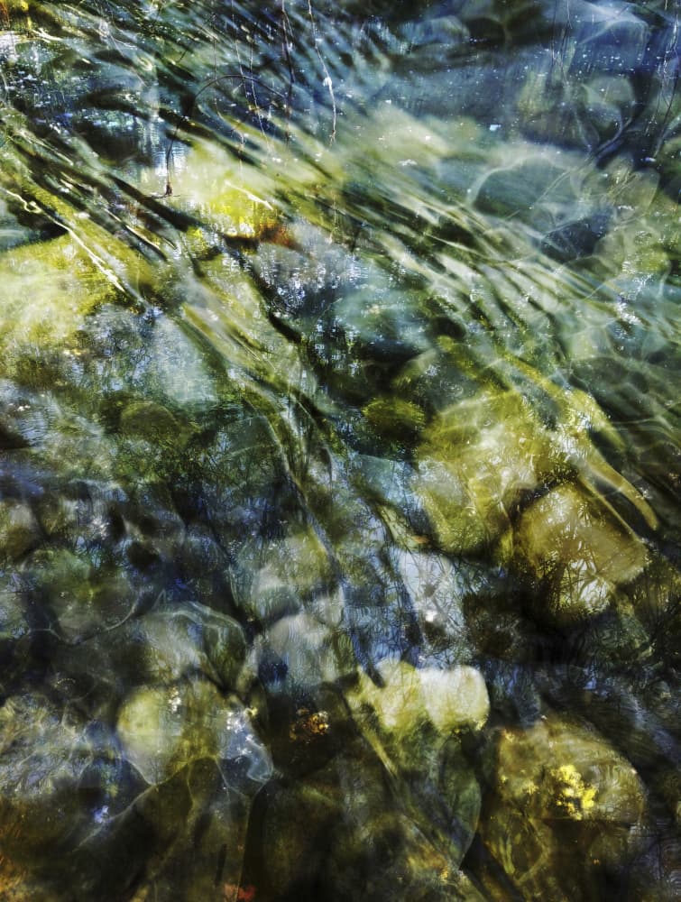 Flowing River Stones by Angelo Cerantola — canvas wall art