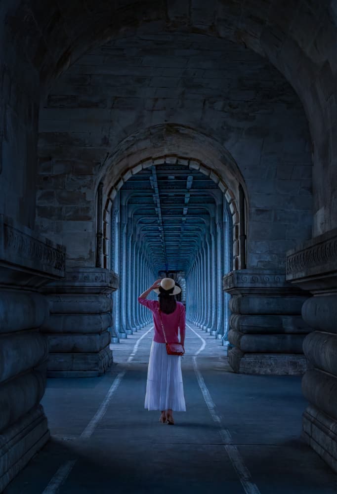 Woman in Arched Tunnel by Kenneth-Wei Zeng — canvas wall art