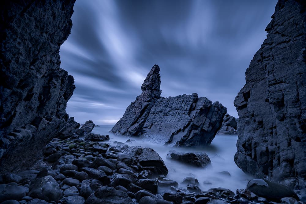 Moody Coastal Rocks by Jingshu Zhu — canvas wall art
