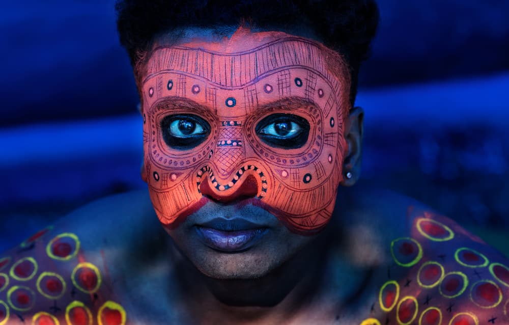 Glowing Tribal Face by Joxe Inazio Kuesta Garmendia — canvas wall art