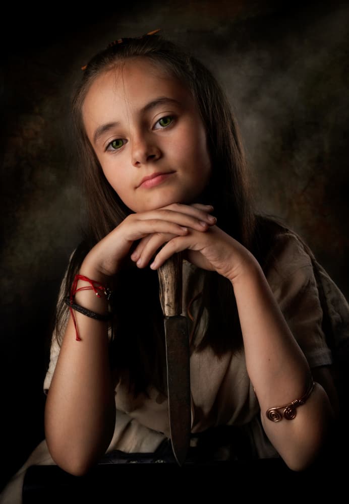 Intense Girl Holding Knife by Grigore Roibu — canvas wall art