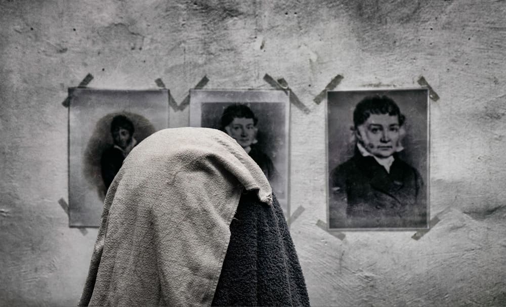 Gazing At Old Portraits by Gilbert Claes — canvas wall art