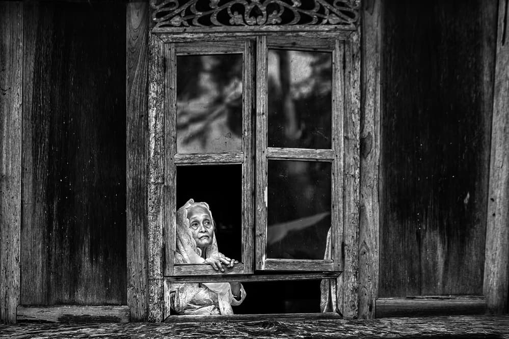 Elderly Woman Window View by Gunarto Song — canvas wall art