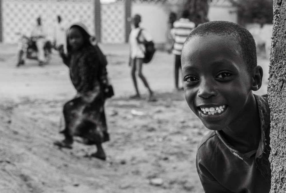 Smiling African Boy by Nasser Al-Nasser — canvas wall art