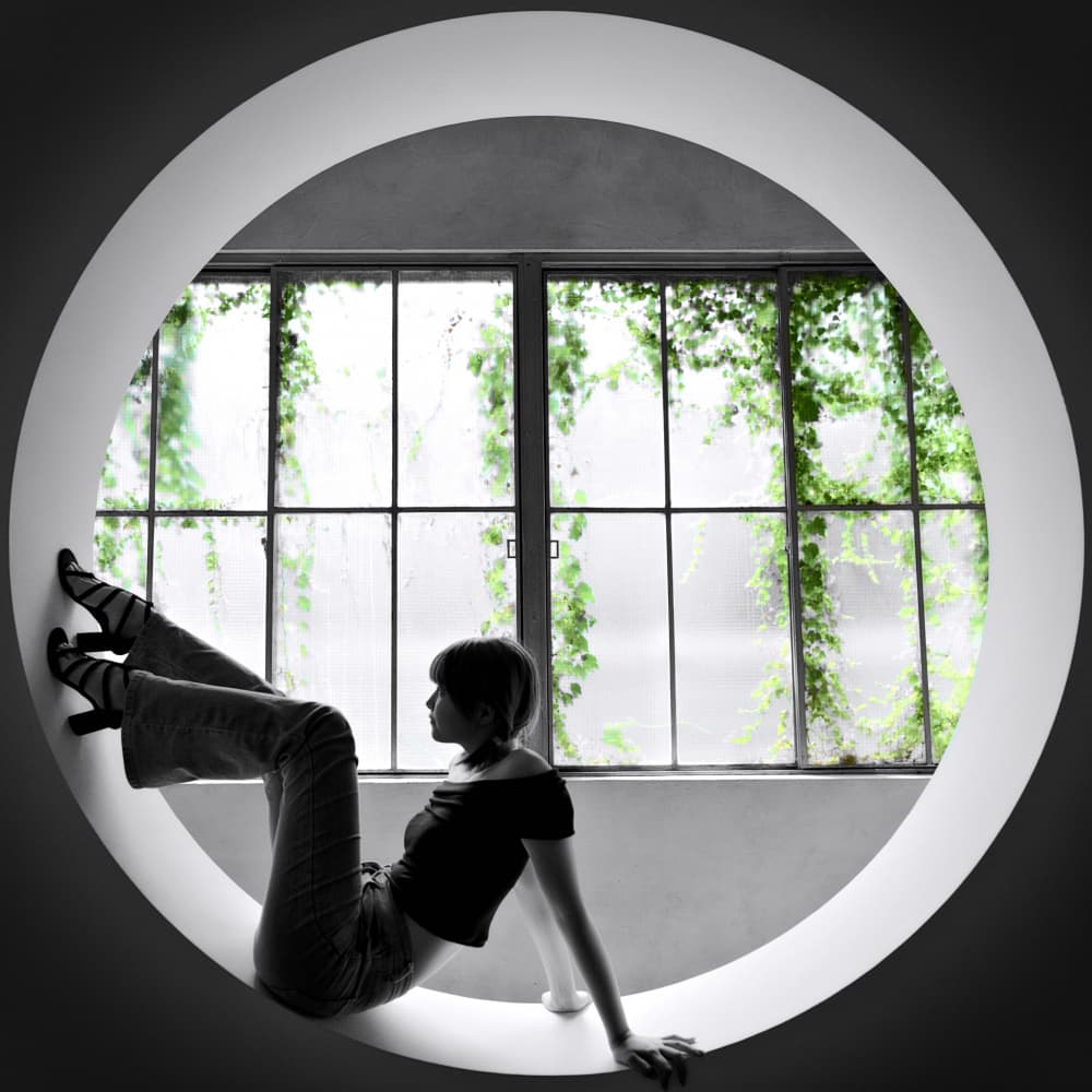 Woman In Round Window by moucorn — canvas wall art