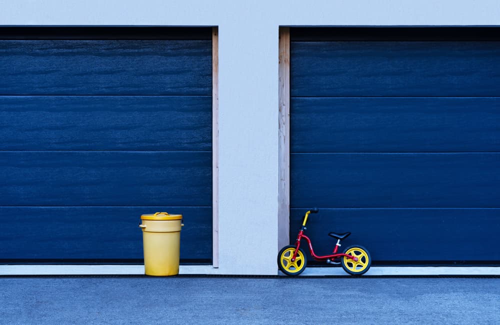 Red Bike Blue Garages by Streiff Marcel — canvas wall art