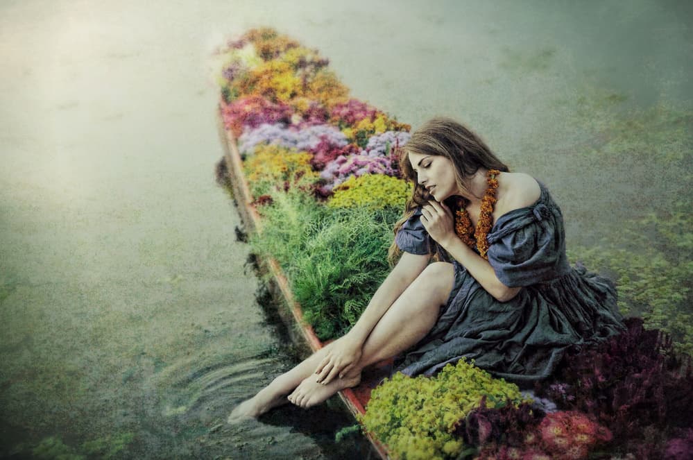 Woman in Flower Boat by kenp — canvas wall art
