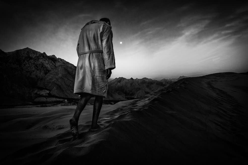 Man Under Desert Moon by Ali Khataw — canvas wall art