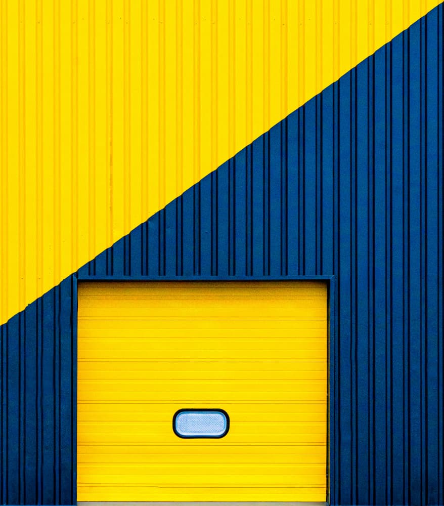 Vibrant Geometric Building by Jef Flour — canvas wall art