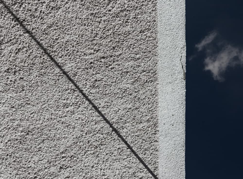 Shadow on Textured Wall by Jeroen van de Wiel — canvas wall art