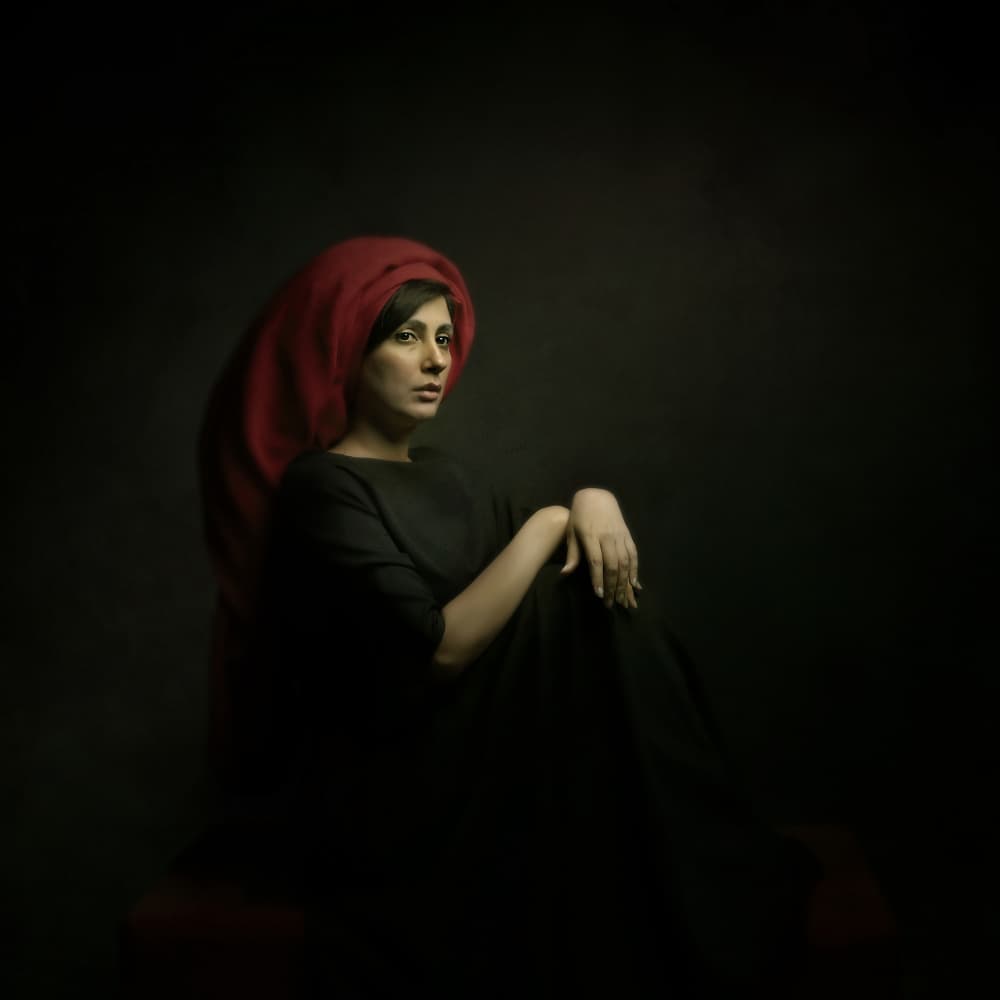 Woman in Red Headscarf by Moein Hasheminasab — canvas wall art