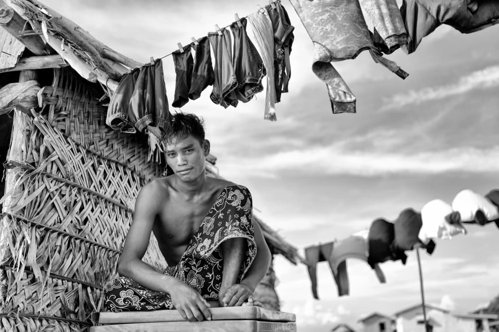 Man Under Clothesline by Kieron Long — canvas wall art