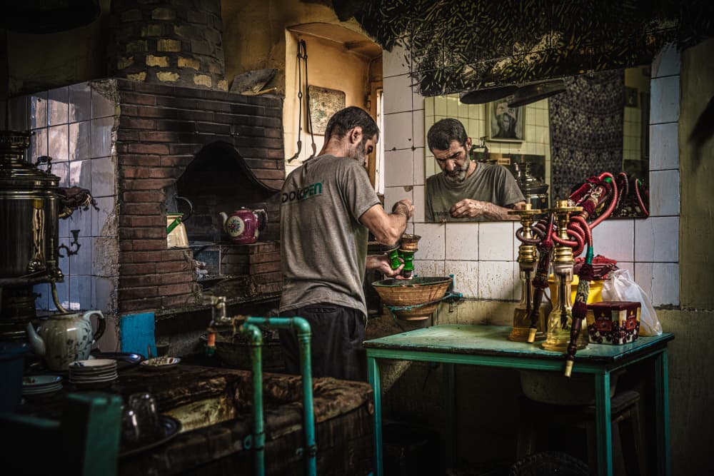 Shisha Cafe Worker by Marco Tagliarino — canvas wall art