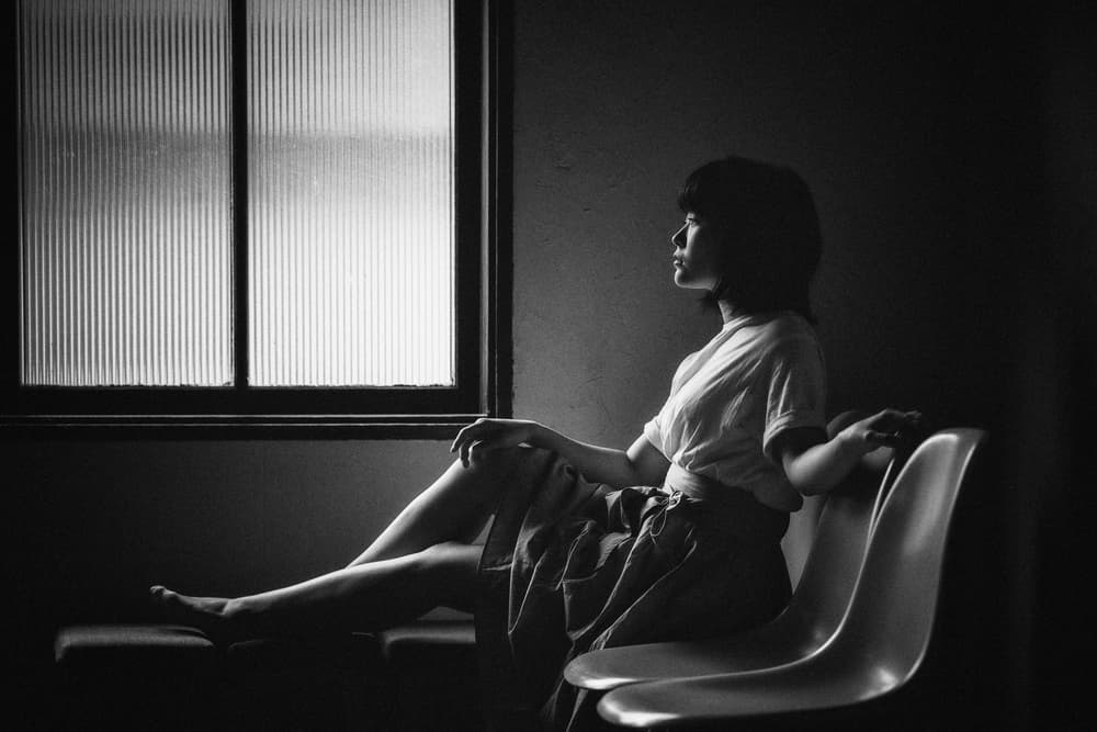 Thoughtful Woman Window by Nobu Ishijima — canvas wall art