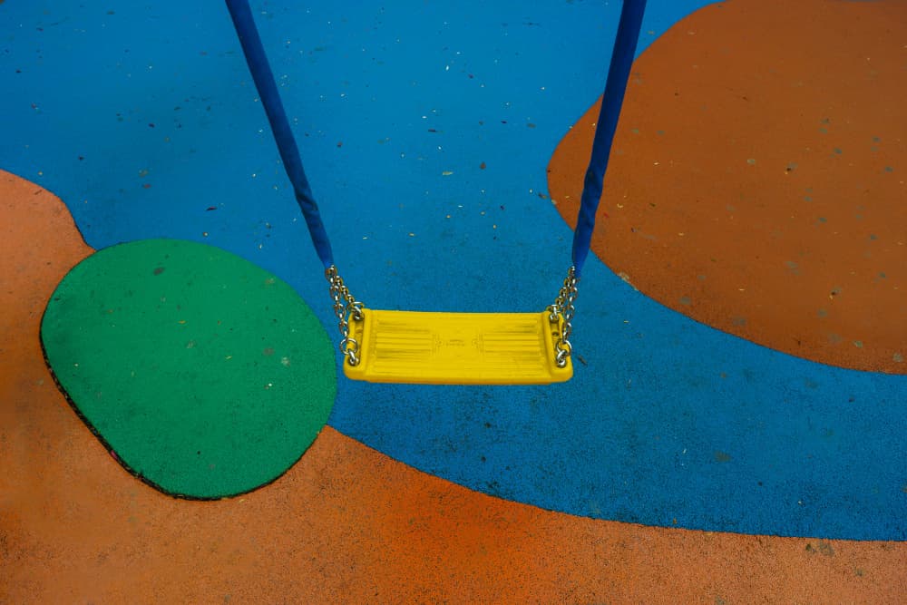Colorful Playground Swing by Jure Kravanja — canvas wall art
