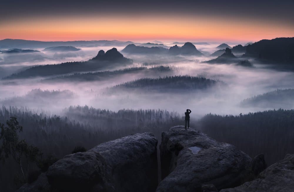 Dawn Over Misty Peaks by Karol Nienartowicz — canvas wall art
