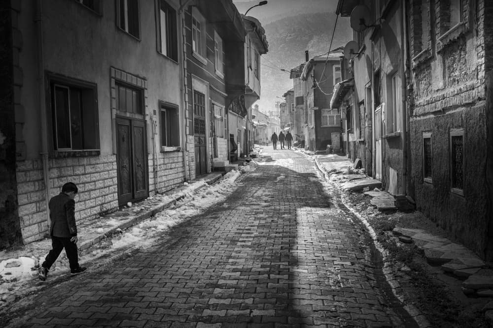 Old Town Winter Walk by Zühdü Bilgin — canvas wall art